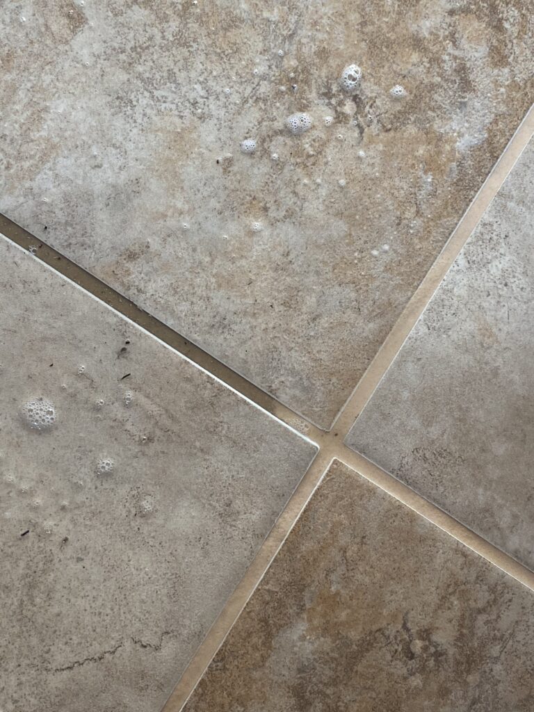 cleaning grout in commercial building